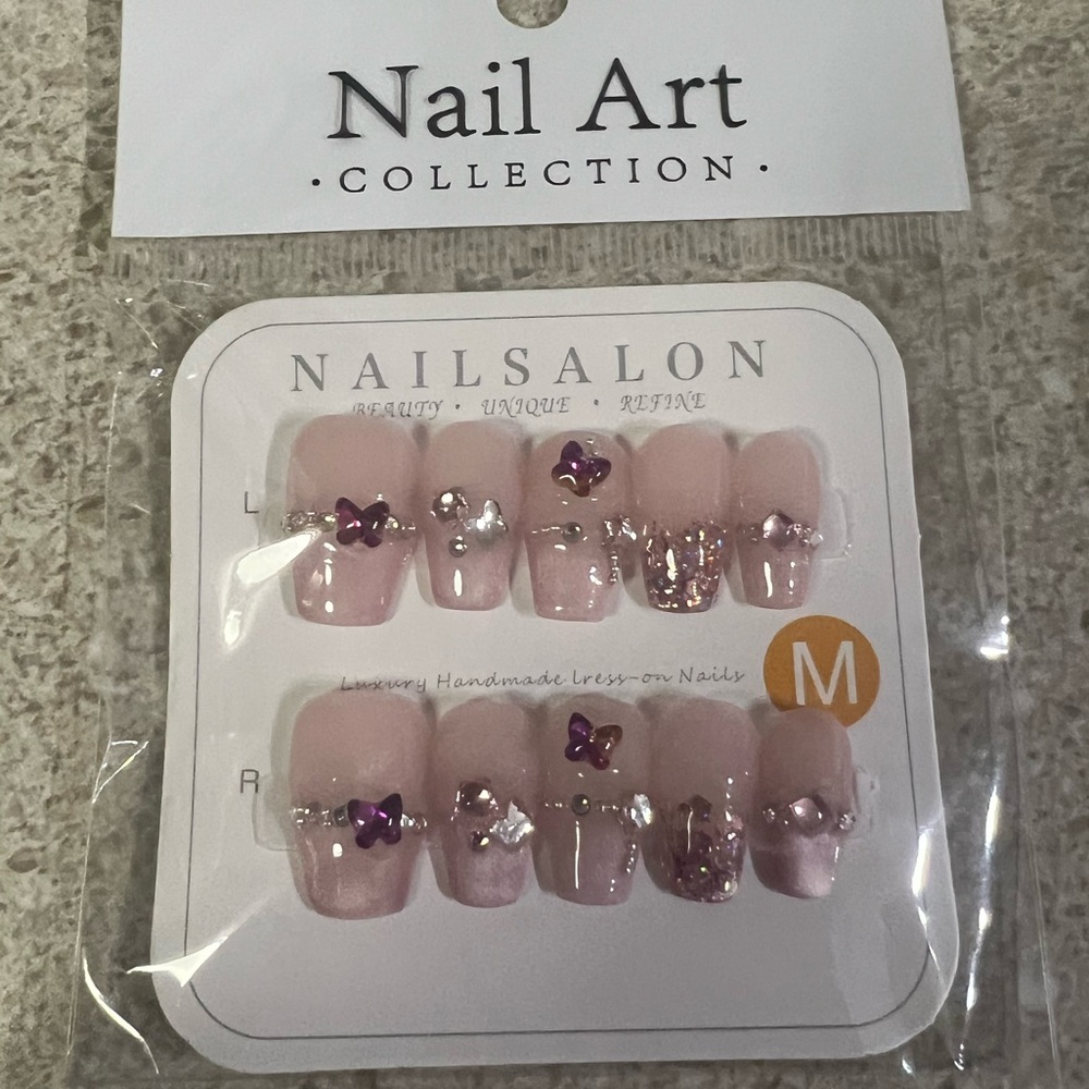 Press on nails!  Pink and purple